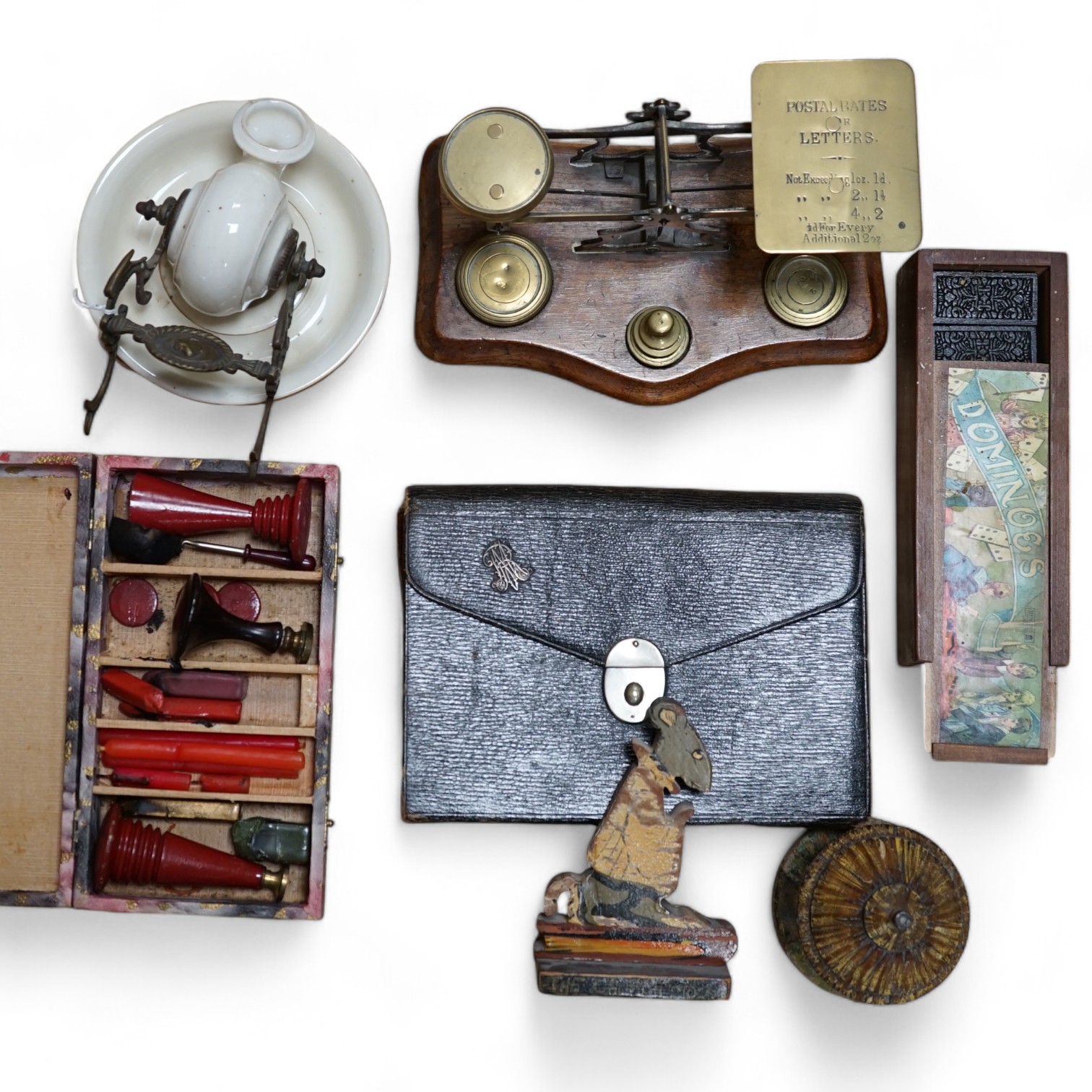 A pair of brass letter scales, a novelty ink pot, a Gladstone bag, a maple framed sketch, a googlie eyed doll’s head, a tin plate Jumbo toy, Dominoes, boxed seal kit and a leather travelling stationary case etc., scales